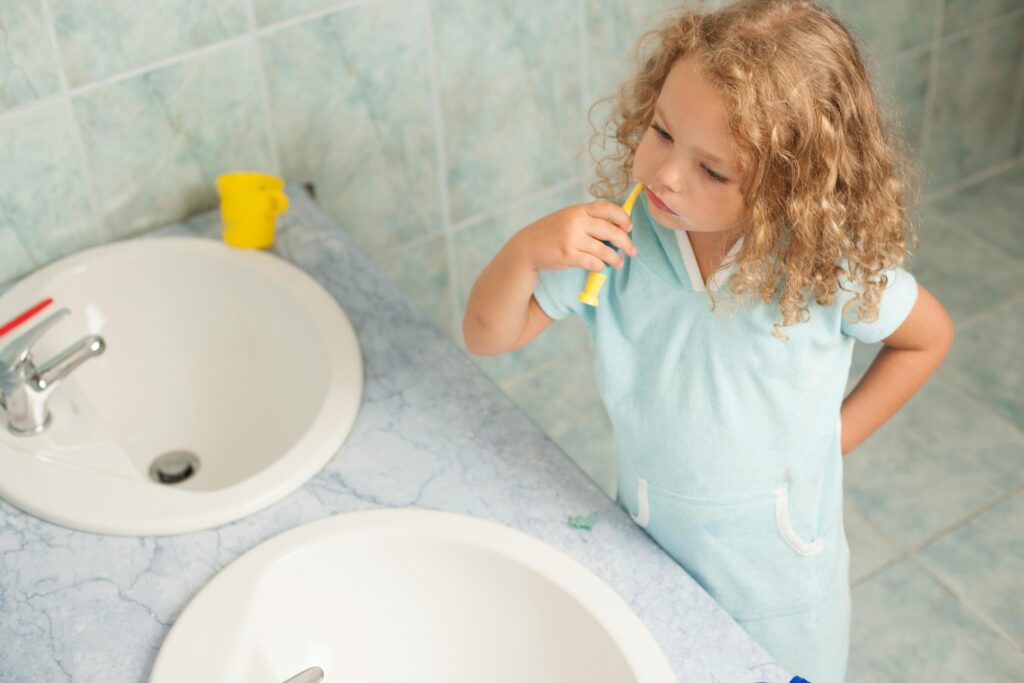 Toddler brushing teeth