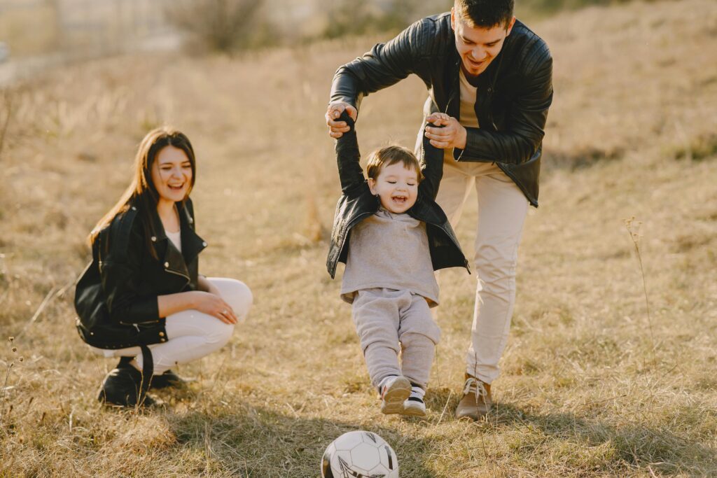 A parent playing with their child.